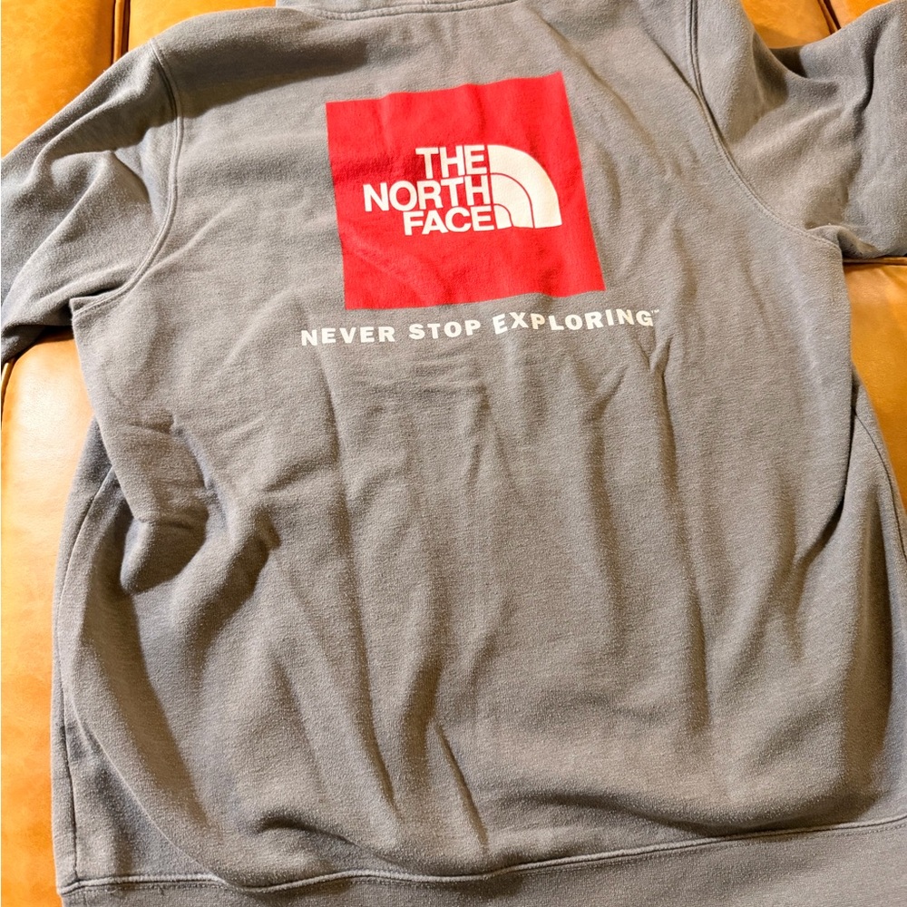 The North Face Pullover Hoodie in Grey with Red Logo on Back